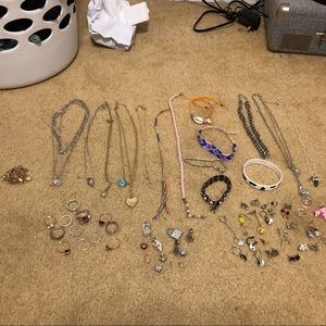 This is a bag full a jewelry, charms, and scraps